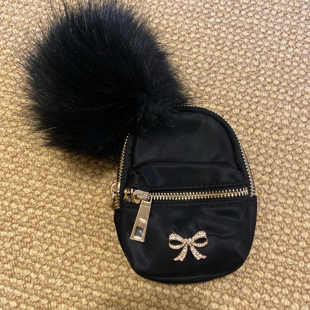 Super cute and chic Mini Backpack keychain with Pom Pom!